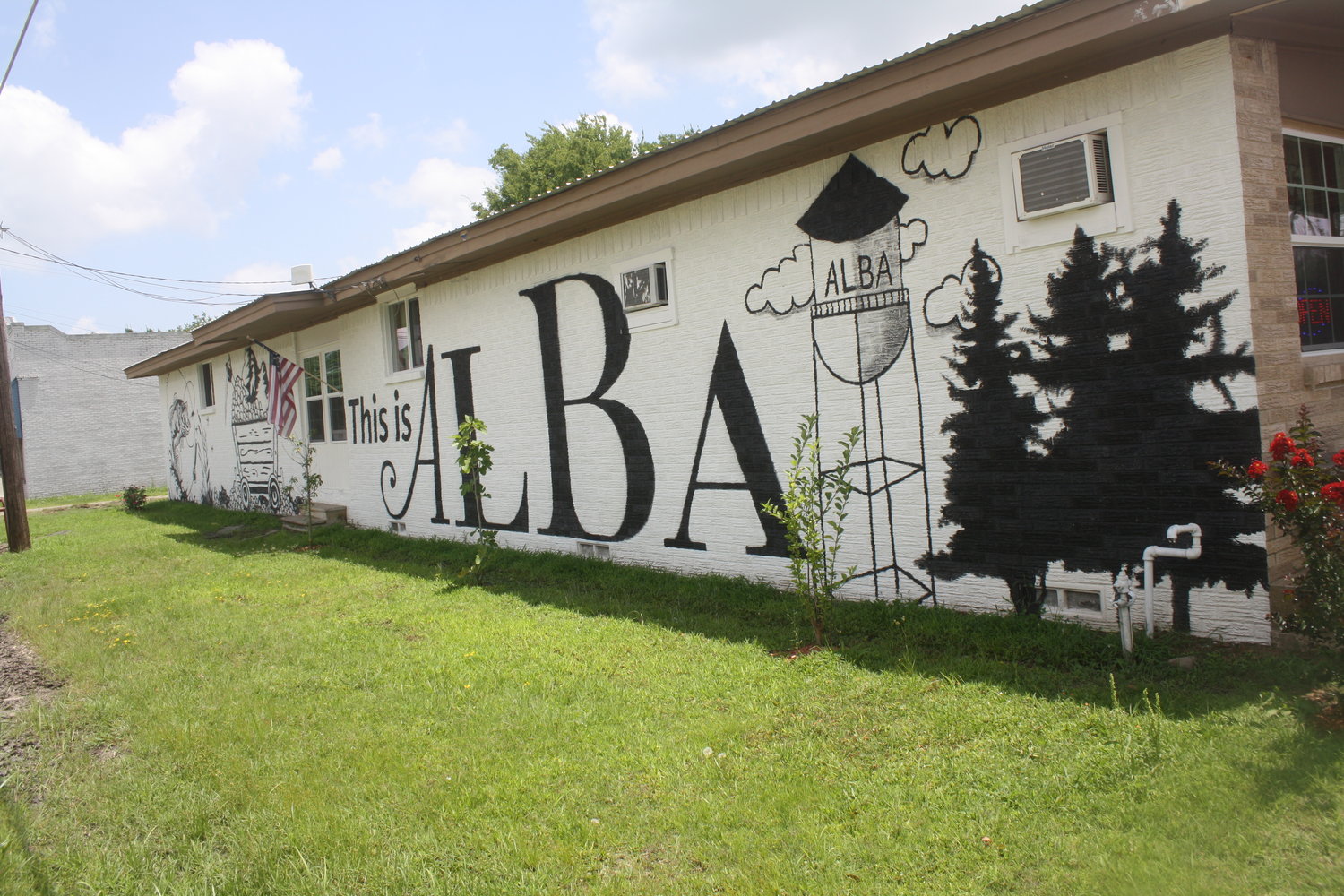 The mural located at antique shop Robin’s Nest at 189 Greenville Street in Alba depicts the origins of the town and its story.